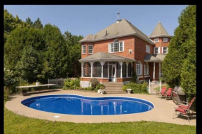 Waterfront heated pool seasonal Acre yard BBQ